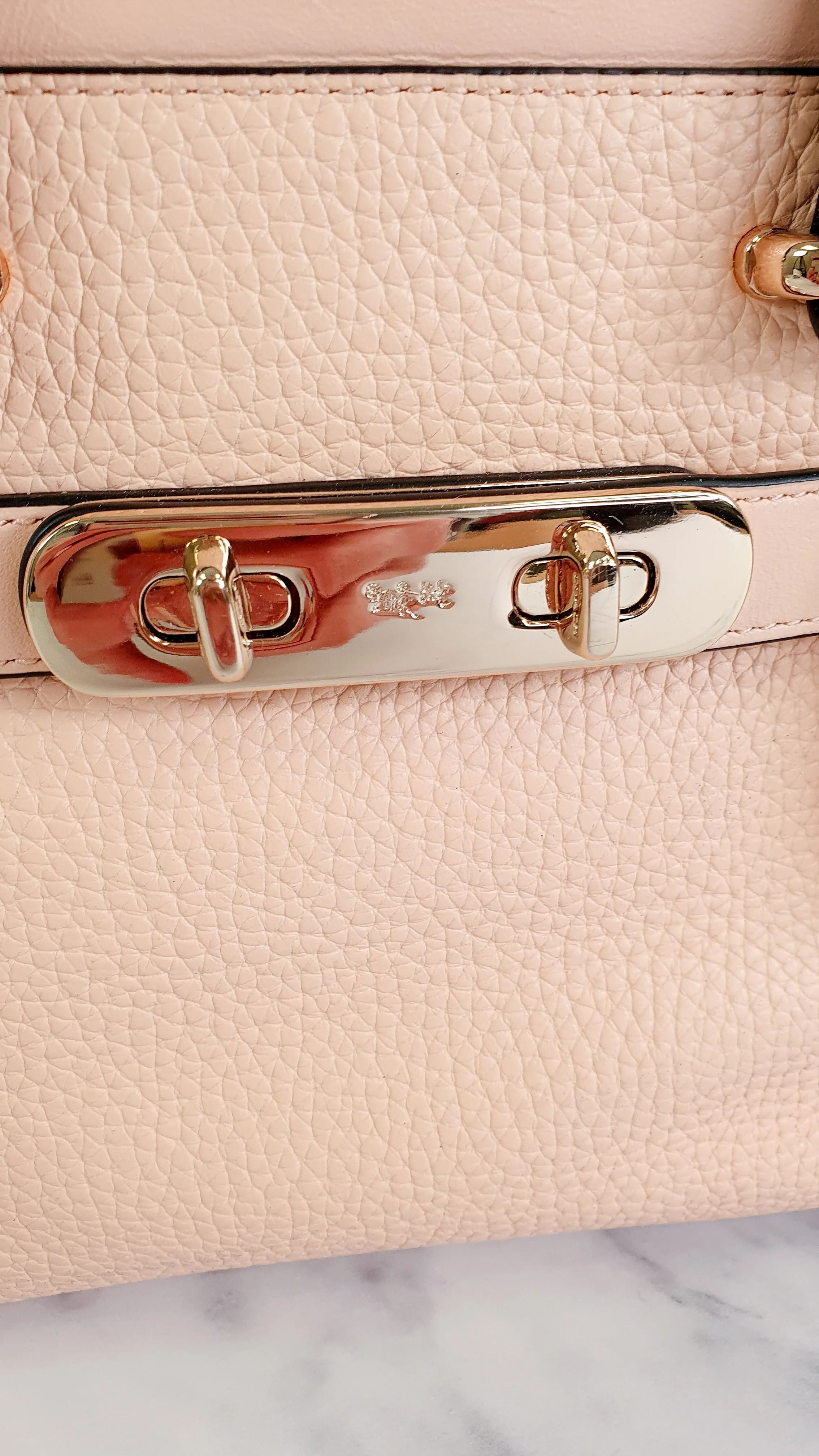 Coach Swagger 27 in Peach Salmon Pink with Colorblock Black Handles - Pebble Leather HandbagCrossbody Bag - Coach 34417