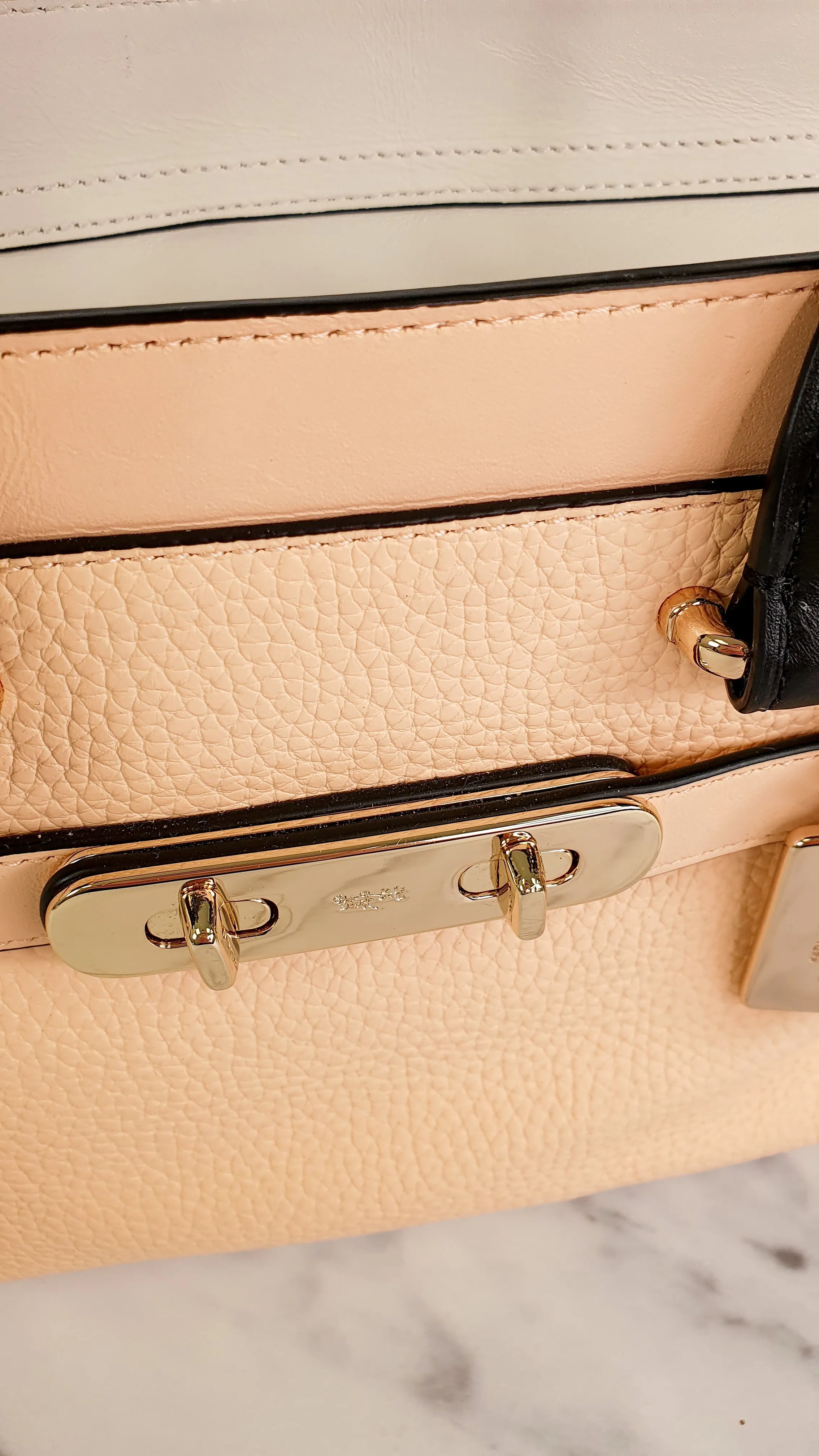 Coach Swagger 27 in Peach Salmon Pink with Colorblock Black Handles - Pebble Leather HandbagCrossbody Bag - Coach 34417