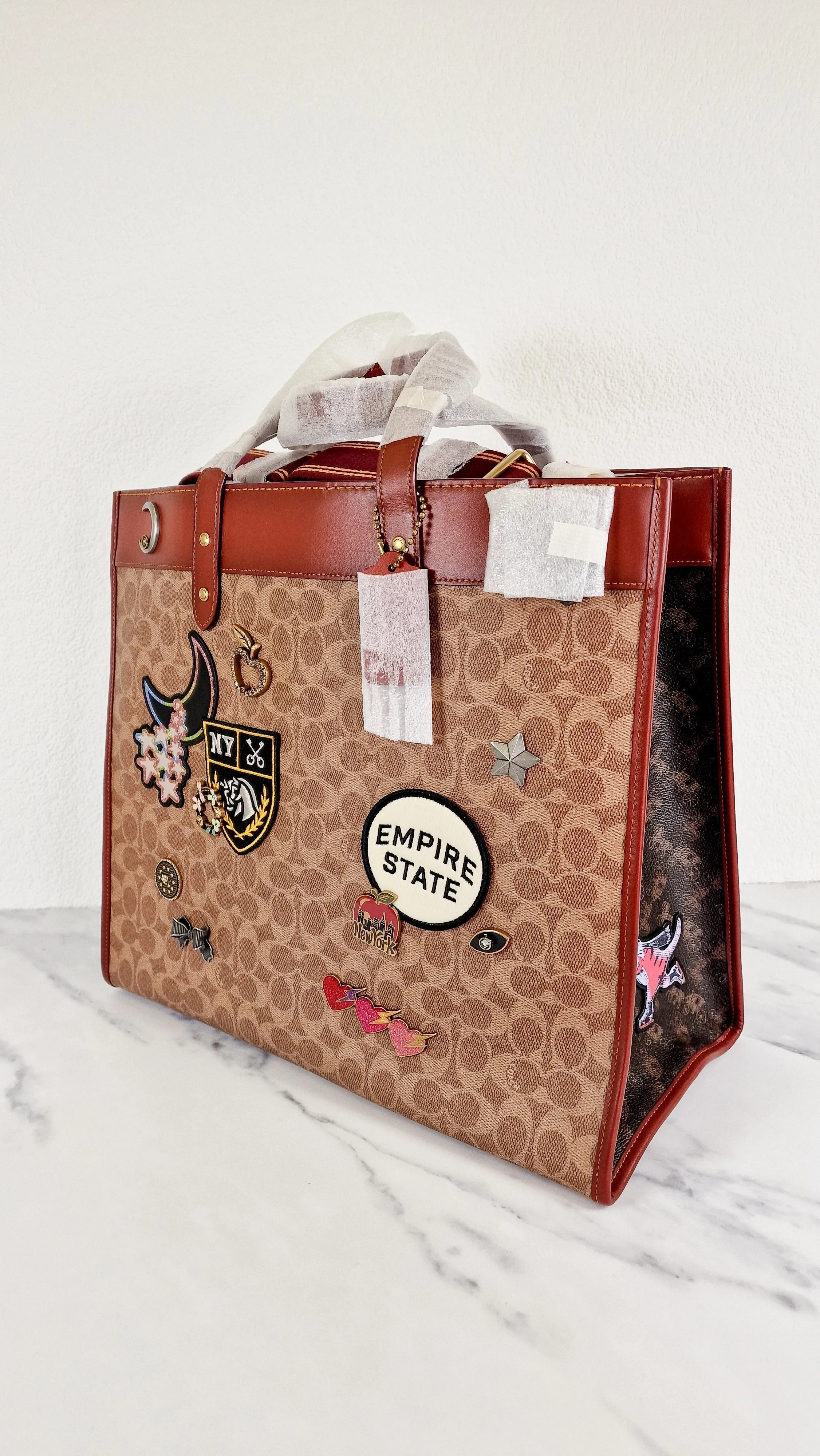 Field Tote 40 in Signature Canvas with Souvenir Patches and Pins Empire State Rexy - Tan Rust Saddle Brown Shoulder Bag Crossbody - Coach C0768