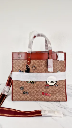 Field Tote 40 in Signature Canvas with Souvenir Patches and Pins Empire State Rexy - Tan Rust Saddle Brown Shoulder Bag Crossbody - Coach C0768
