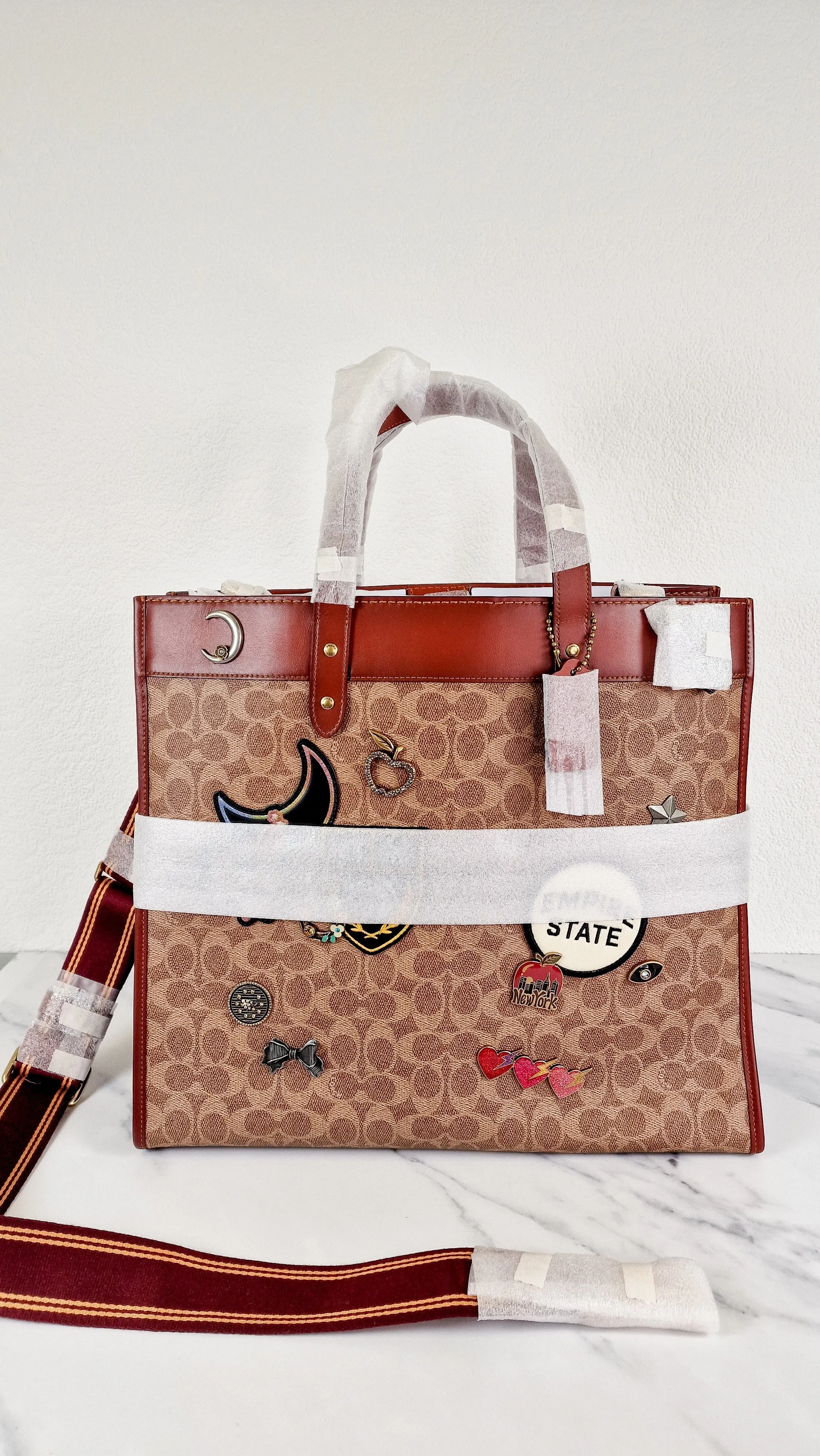 Field Tote 40 in Signature Canvas with Souvenir Patches and Pins Empire State Rexy - Tan Rust Saddle Brown Shoulder Bag Crossbody - Coach C0768